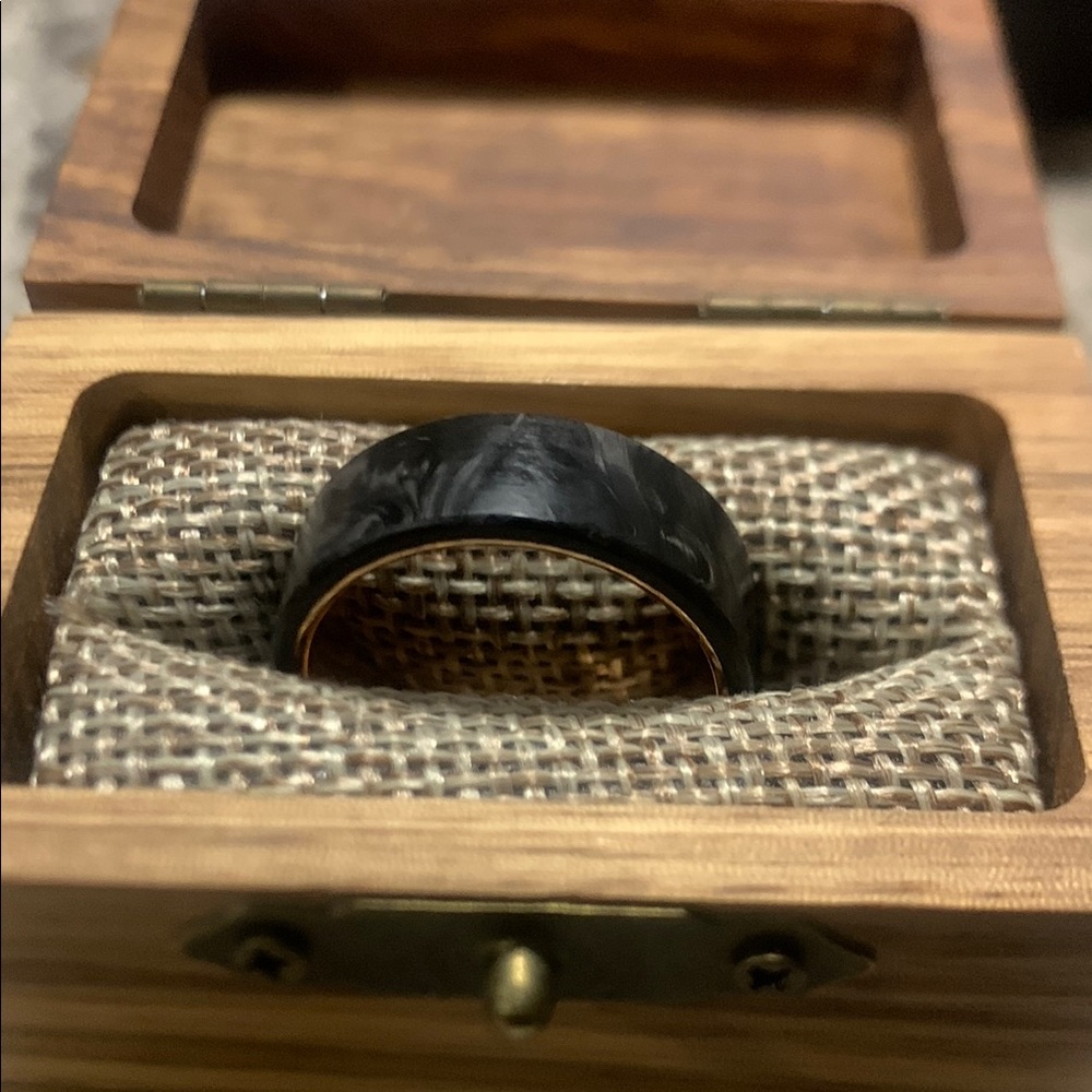 Black and Gold Jewelry Ring with Rustic Presentation